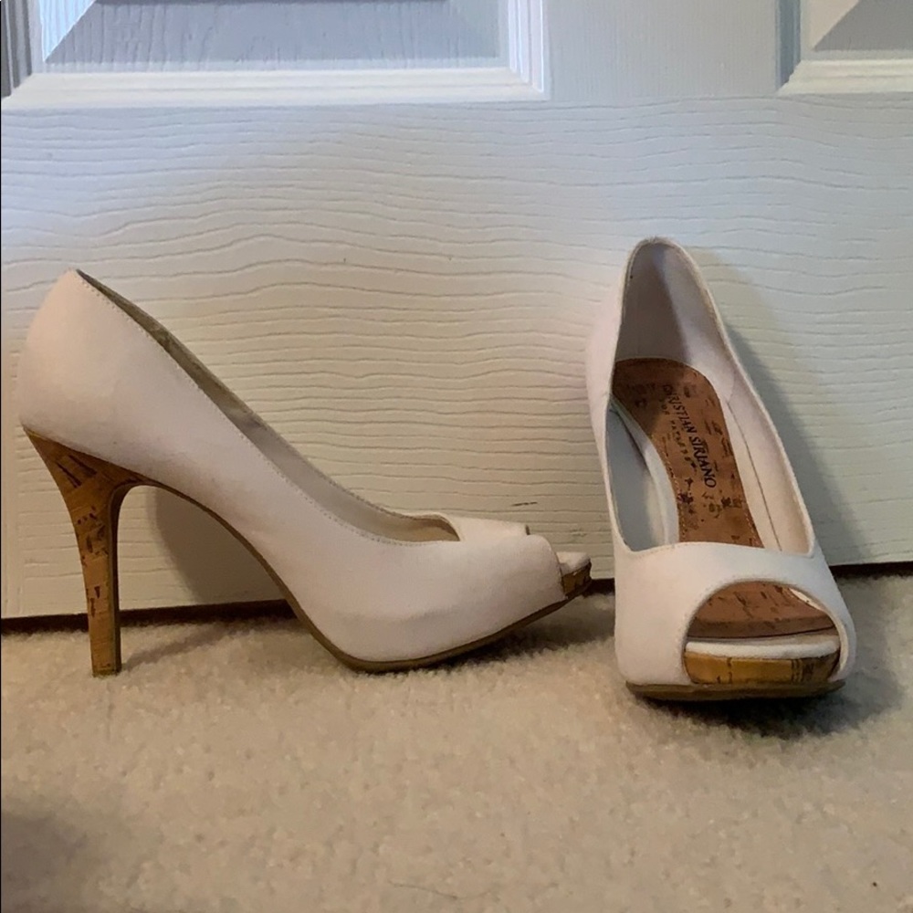 White heels with a cork accent